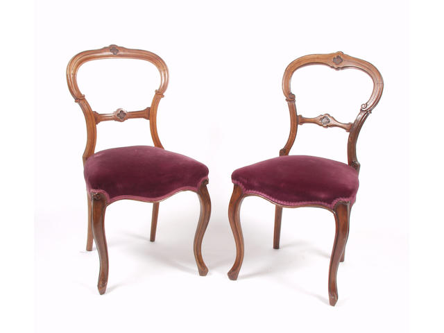 A matched set of six late Victorian walnut chairs