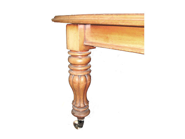 A Victorian mahogany dining table
