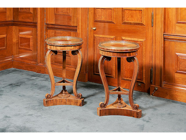 A pair of early 19th century mahogany plant stands