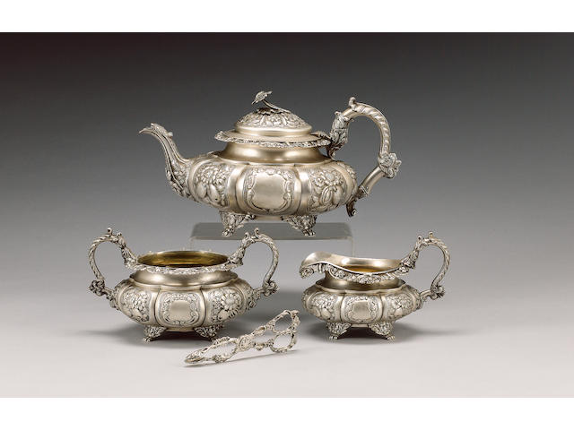 A George IV Irish silver three piece tea service, by James Fray, Dublin 1825 / 1827, the sugar bowl and milk jug stamped twice with date letter,