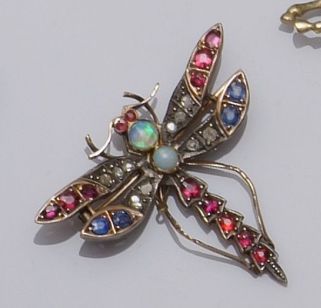 A multigem set dragonfly brooch
