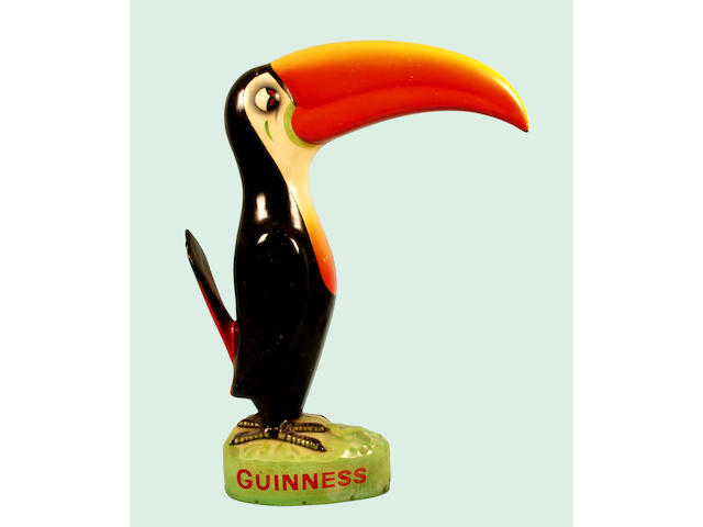 Guiness, a very large composite model of the Toucan 68cm high.