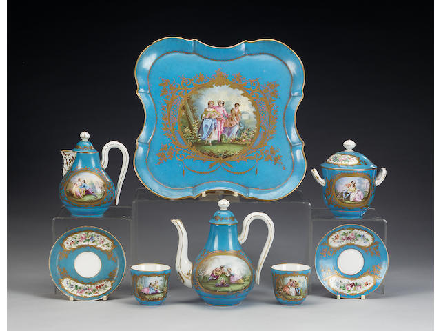 A S&#232;vres style turquoise ground composite tete-a-tete, two cups and saucers and a hot water jug, late 19th century,