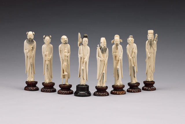 Eight stained ivory figures,