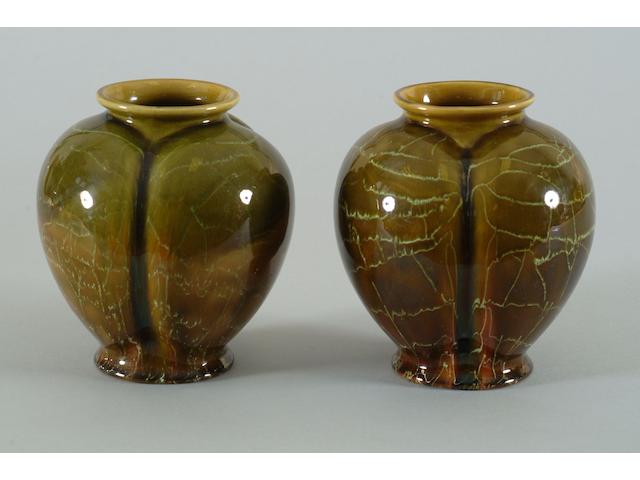 A pair of Linthorpe pottery vases