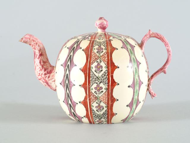 An 18th Century creamware teapot and cover