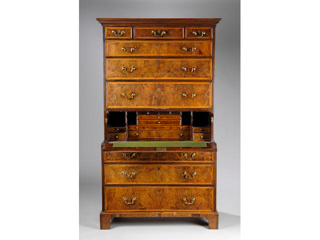 A George I walnut and feather banded secretaire chest on chest,