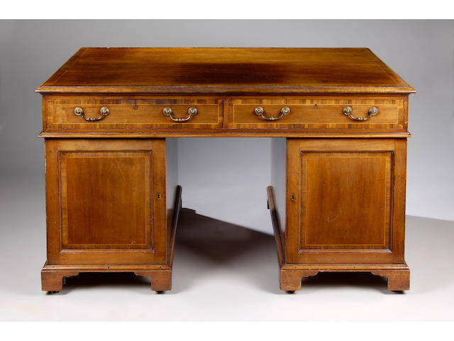 A mahogany and boxwood strung pedestal desk,