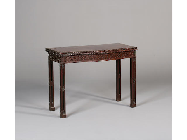 A mahogany serpentine concertina action tea tablein the Chinese Chippendale style