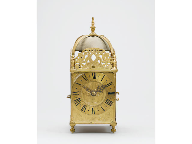 A brass weight driven lantern clock, probably 20th Century,