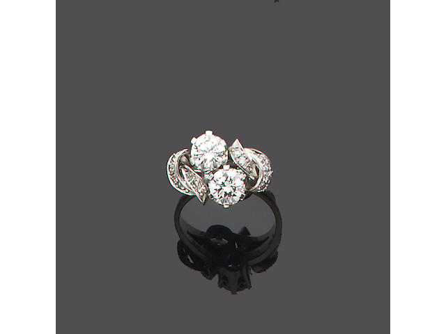 A diamond two-stone crossover ring