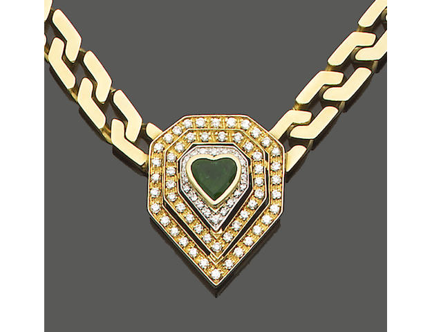A diamond and emerald pendant