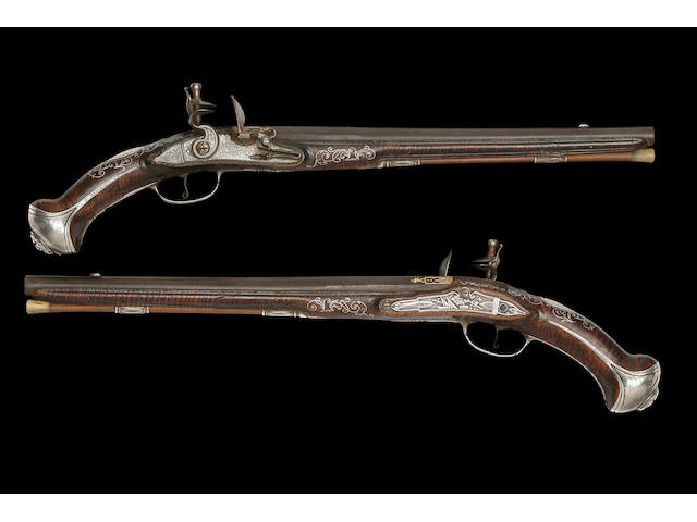 A Very Fine Pair Of French 22-Bore Silver-Mounted Flintlock Holster Pistols