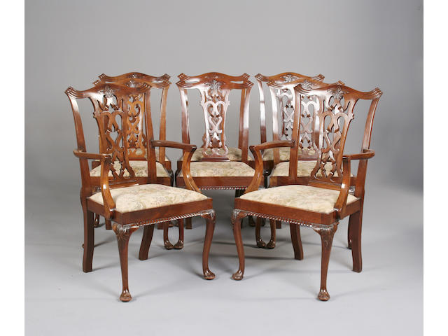 A set of eight George III style mahogany dinning chairs