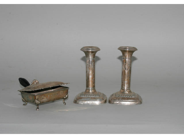 A pair of small candlesticks,