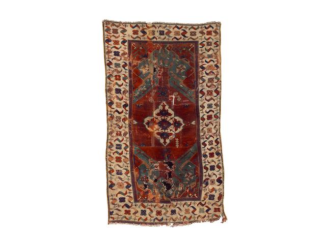 A rare and unusual 17th century West Anatolian rug 6 ft 4 in x 3 ft 7 in (194 x 109 cm) reduced in size, some old repairs, lacking outer guardstripe