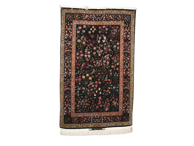 A Tabriz part silk rug North West Persia, 233cm x 142cm signed