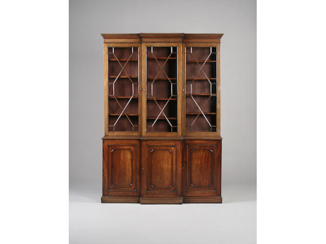 A George III style mahogany breakfront bookcase