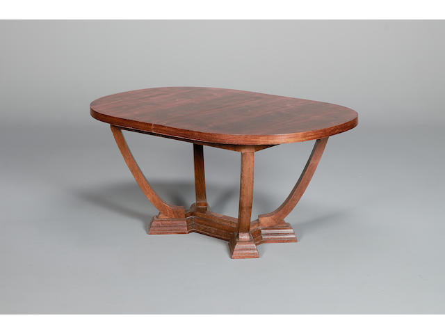 A French Art Deco rosewood extending dining table, circa 1930