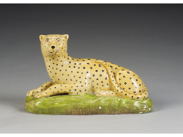 A good pearlware model of a leopard, circa 1815-20,