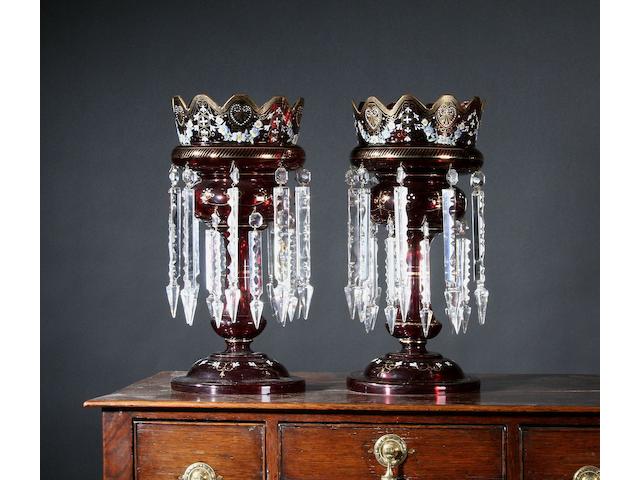 A pair of ruby glass lustres,