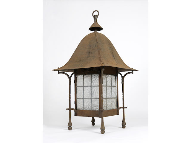 In the style of Sir Robert Lorimer and Thomas Haddon A very large Arts and Crafts wrought iron lantern