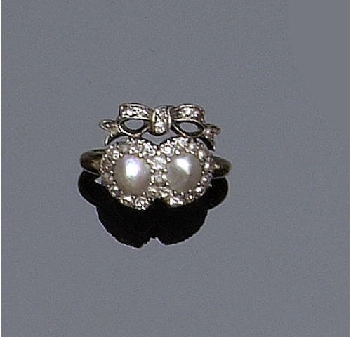 A diamond and pearl ring
