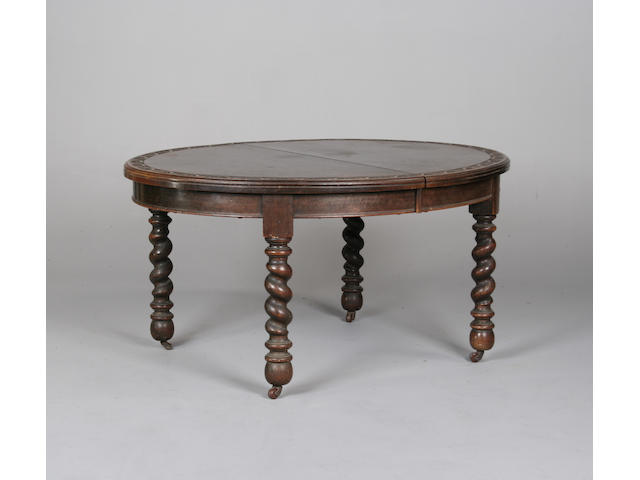 An early 20th Century oak dining table, with one additional leaf, 196cm x 121cm deep x 75cm high.