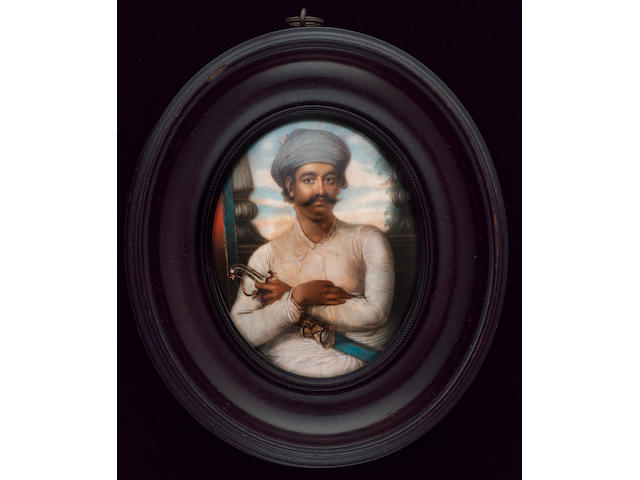 Ozias Humphry R.A., Prince Jawan Bakht (c.1749-1788) the Shahzada, three-quarter length, seated, his arms folded across his sword, wearing white muslin dress and pale blue turban, the background of a window and pillars