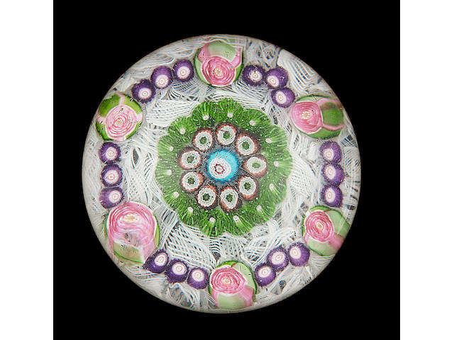 A Clichy patterned millefiori on muslin ground paperweight, circa 1850,