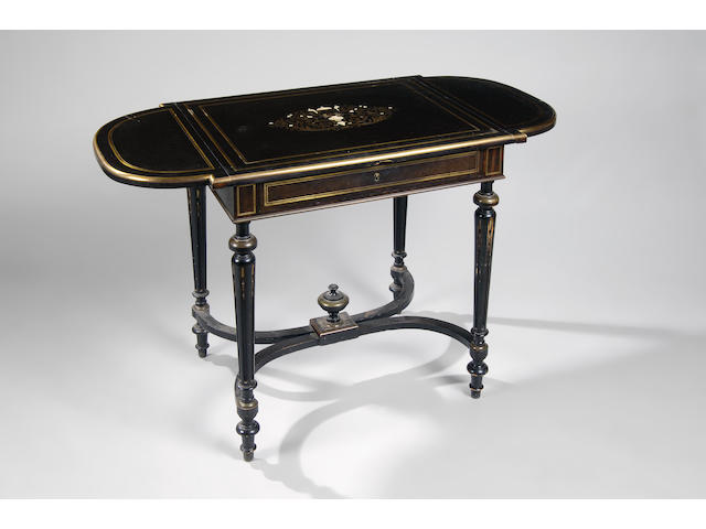 A 19th century ebonised, brass and ivory inlaid drop leaf side table