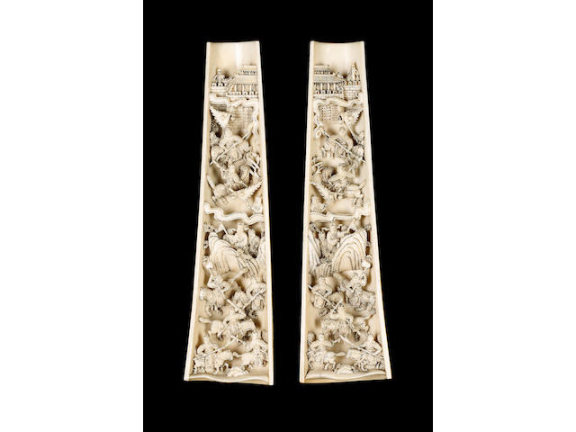 A pair of ivory wrist rests;