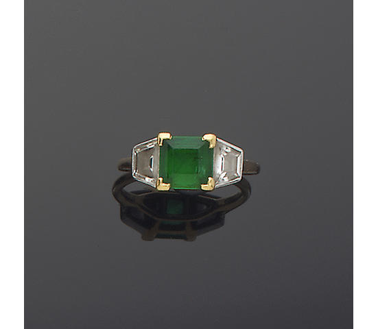 An emerald and diamond ring, by Cartier