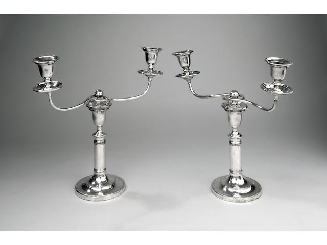 A pair of silver on copper telescopic twin branch candlelabra, 19th Century,