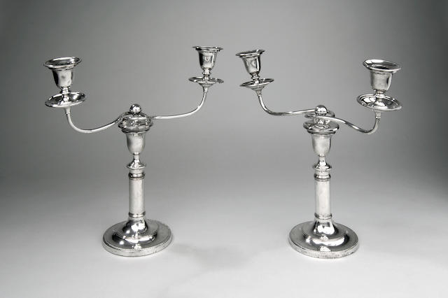 A pair of silver on copper telescopic twin branch candlelabra, 19th Century,