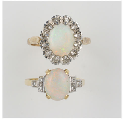An 18ct gold opal ring, (2)