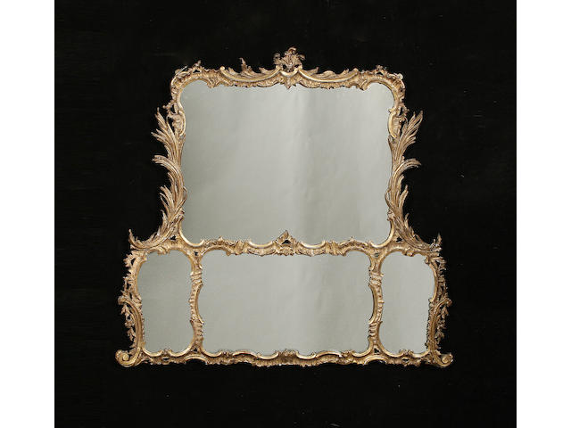 A 19th Century French gilt carved overmantle mirror in the Rococo taste