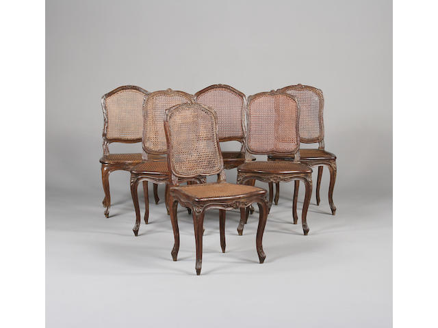 A set of six Louis XV oak fauteuils