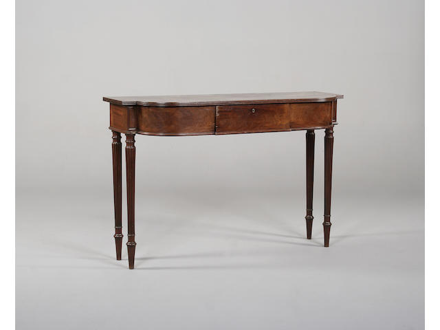 A Regency mahogany serving tablein the manner of Gillow