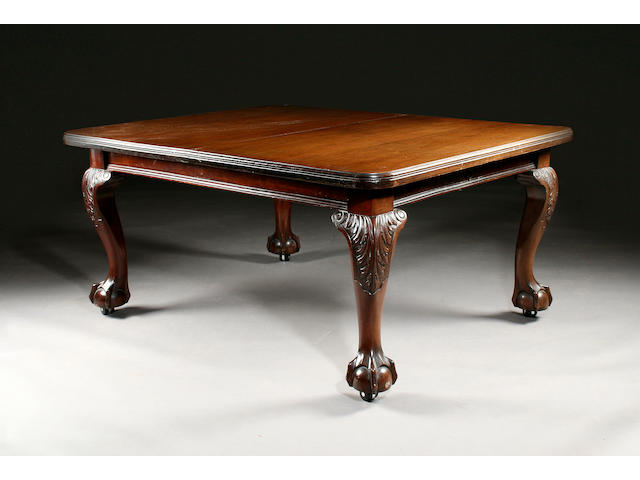 A late Victorian mahogany wind-out extending dining table