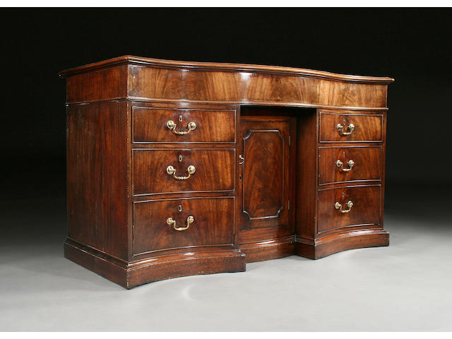 A good George III mahogany serpentine-fronted side cabinet