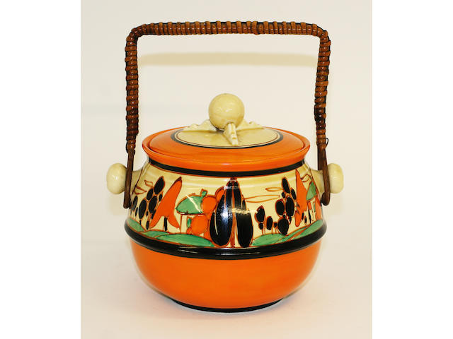 A Clarice Cliff Fantasque biscuit barrel and cover,