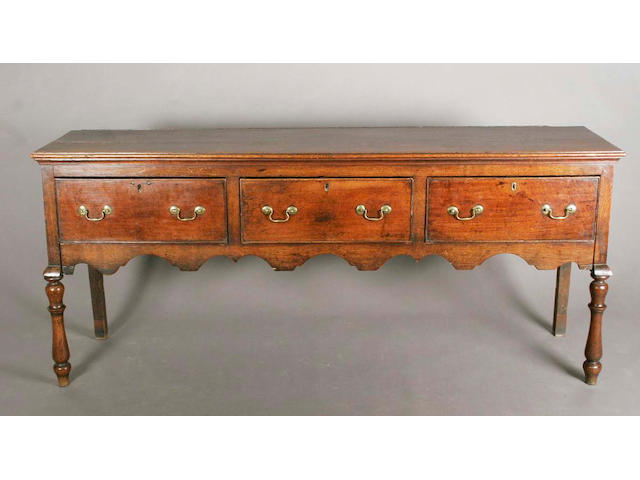 A mid/late 18th century oak dresser base,