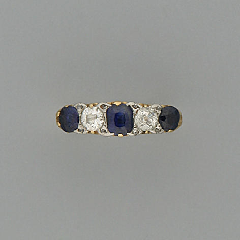 A Victorian sapphire and diamond half hoop ring,