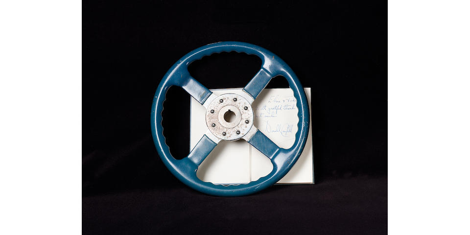 The steering wheel used in Donald Campbell's Bluebird K4 and K7 record breaking crafts, by Bluemels,