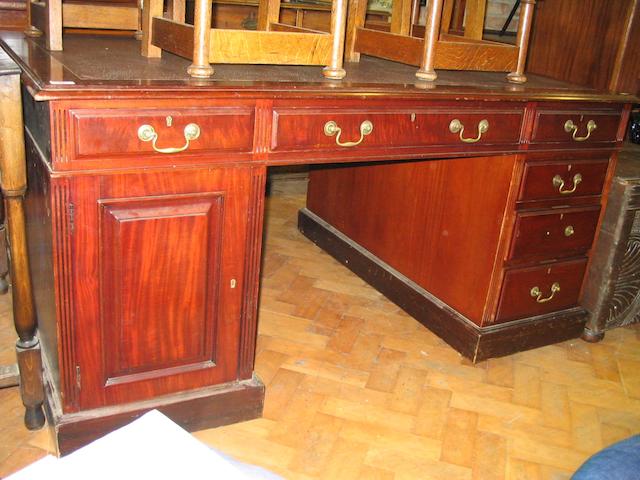 A late 19th Century mahogany partners desk,