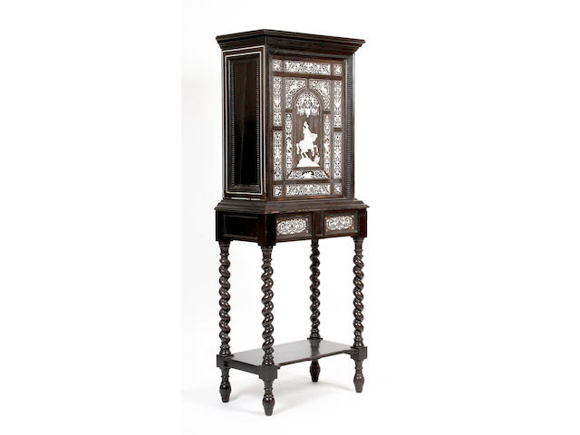 A 19th Century French ebonized and ivory inlaid cabinet