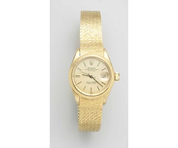 Rolex. An 18ct gold ladies bracelet watch with original box and papersRef:6903, Sold in 1975