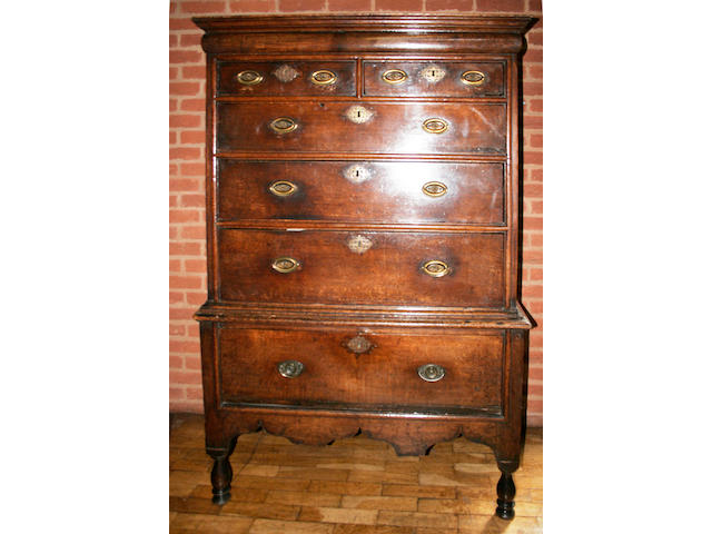 A late 18th century oak chest-on-stand,