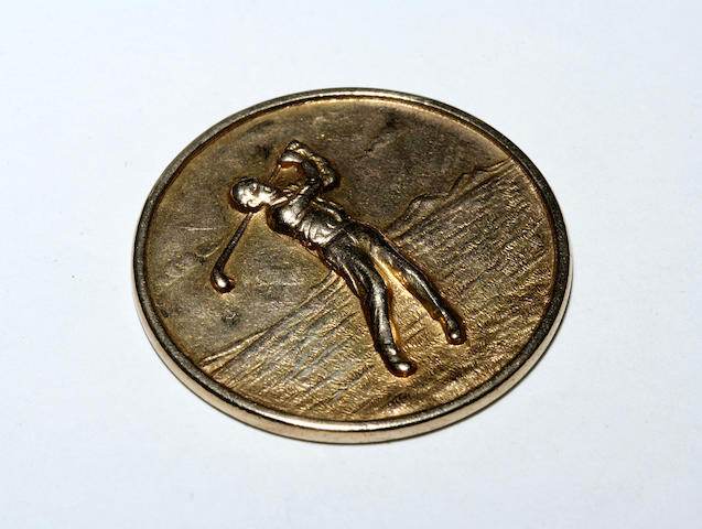 An engraved commemorative 14ct medal